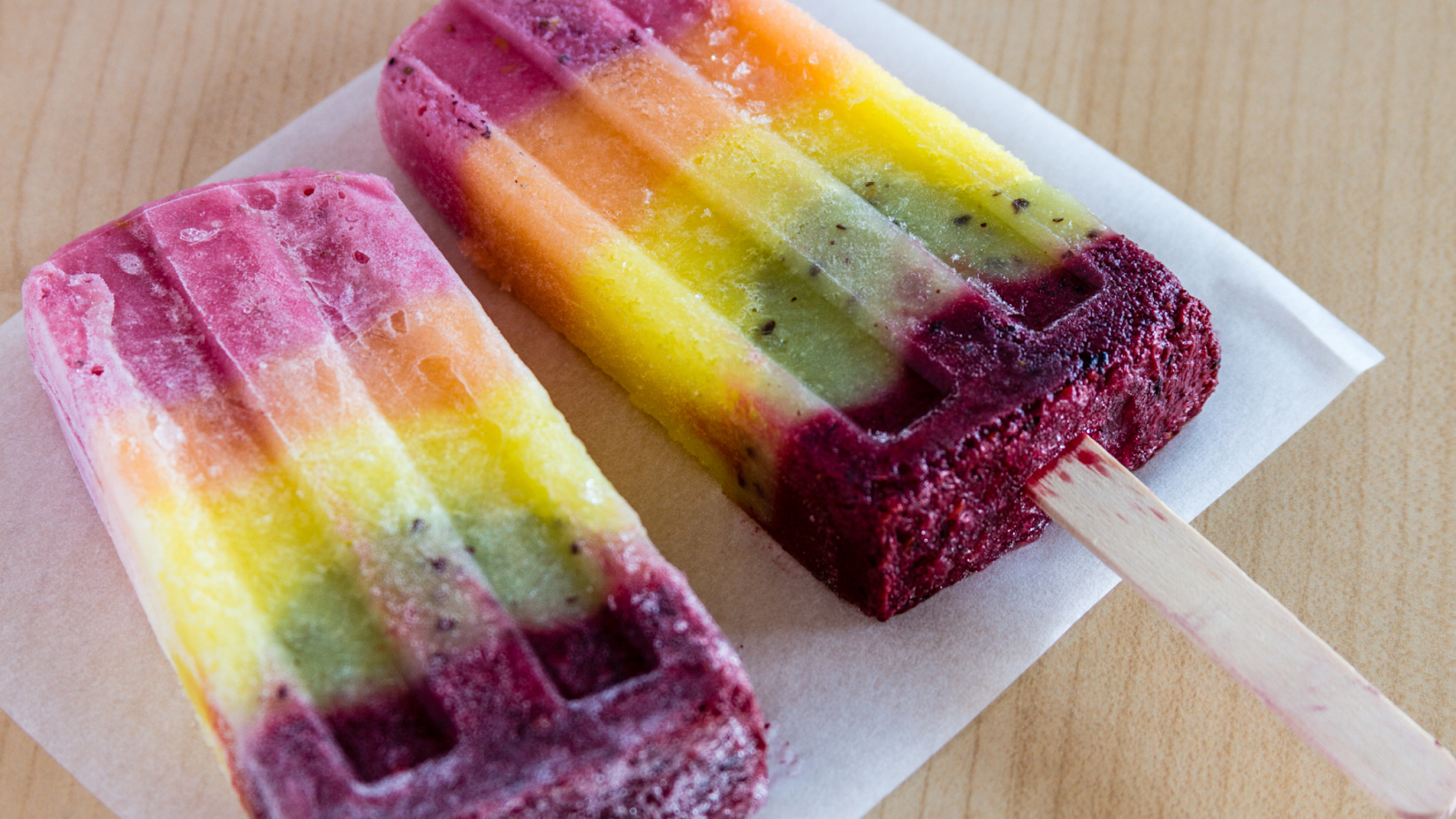 two popsicles on a plate