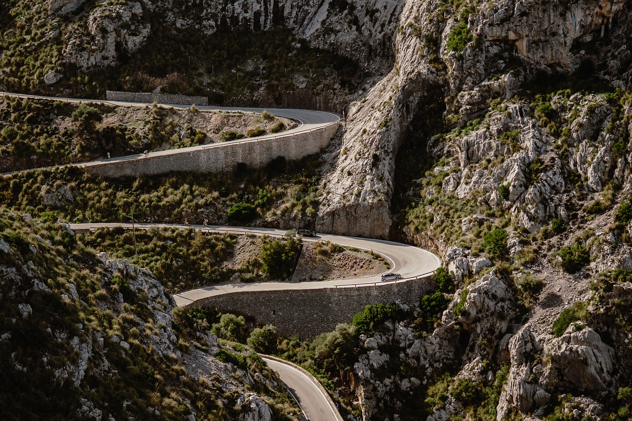 Why are Mountain Roads so Curvy? (+ Tips to drive them)