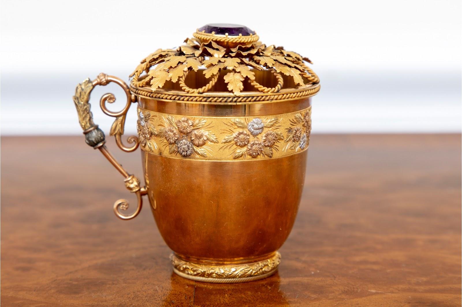 This 1930's Egyptian cup is super decorative.