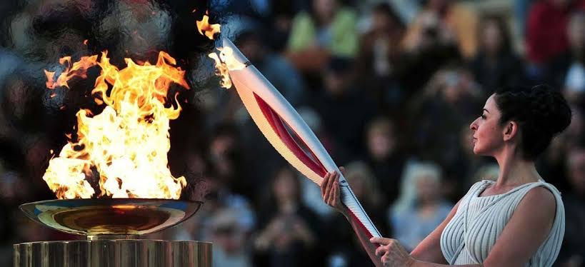 Who had introduced the Olympic Flame?
