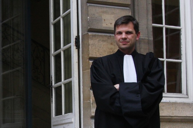 Attorney Gabard, hired by the Falun Gong practitioners to represent them, stands outside of the Paris Administrative Court after the hearing on March 26. (Minghui.org)
