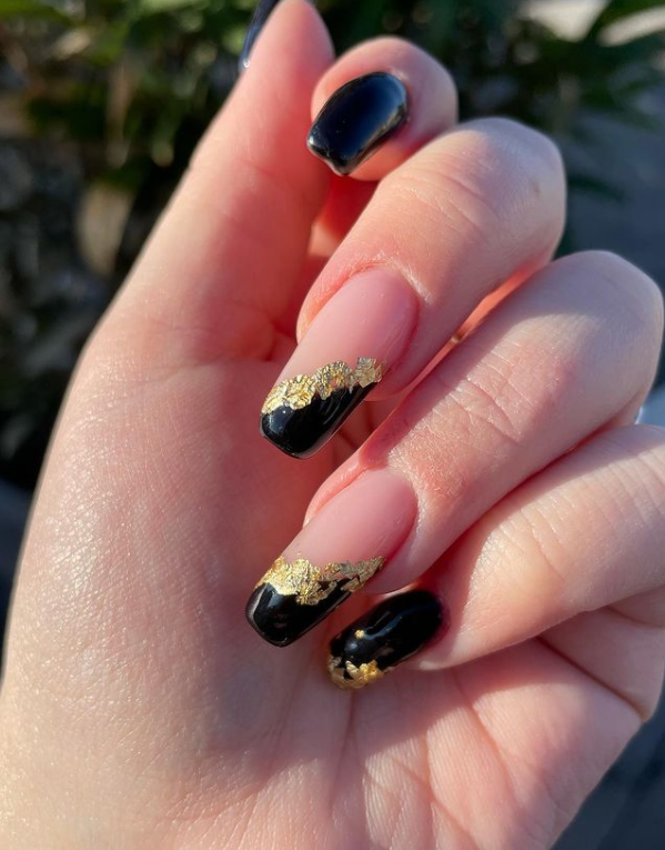 Slanted French Tips black and gold nail designs