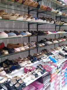 الأحذية العالمية7CFF+HJF، شارع خالد بن الوليد ، حي نخب، الشهداء الشمالية،  الطائف 26513