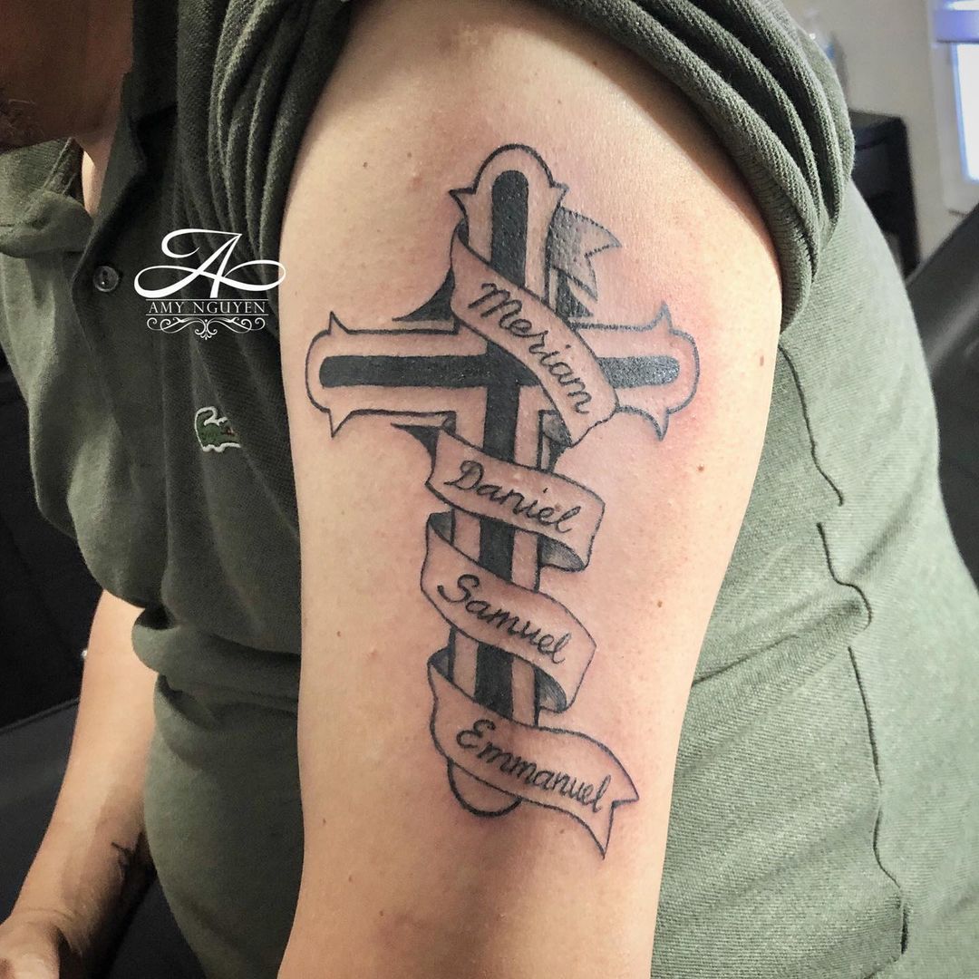 Family Name Cross Arm Tattoo