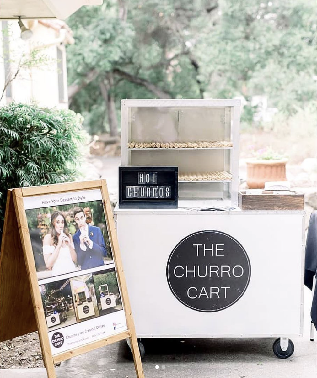 churro cart for fun wedding dessert idea