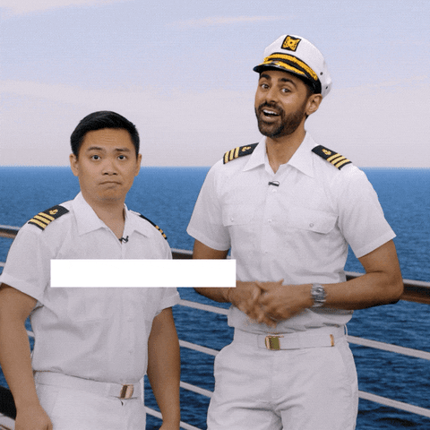 Two shipmates enthusiastically waving  and saying bon voyage. 