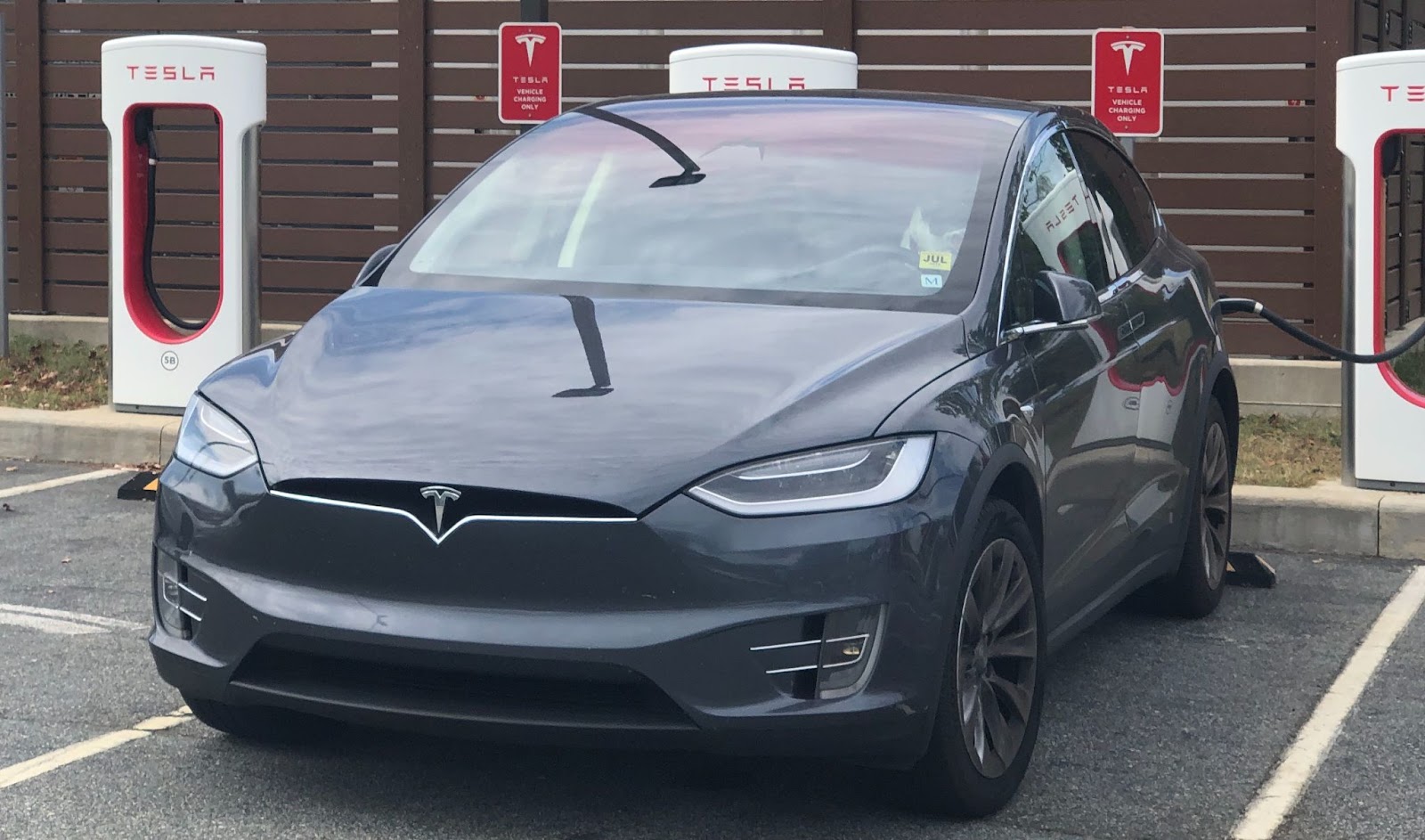 Tesla Model X charging at a Supercharger