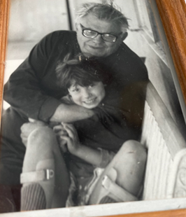 Disability - A childhood photo of me rocking my leg braces with my Grandfather, who took me to my physical therapy appointments so that my mom could keep working full time and keep her good health insurance. 
