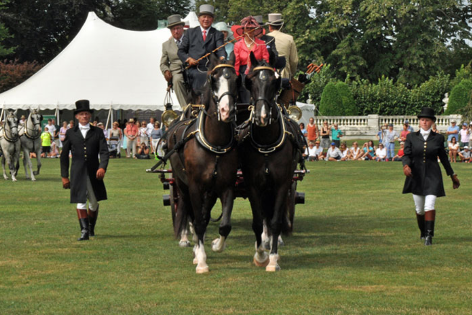 Newport, Rhode Island, as 19th century carriages, led by stately steeds, gallantly gather to herald Coaching Weekend in Newport.  From August 16th  to 19th, The Preservation Society of Newport County hosts members of the Carriage Association of American 