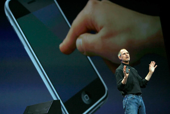 a picture of the very first iPhone announcement with JobS