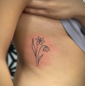Neat And Simple Lily Of The Valley Tattoo