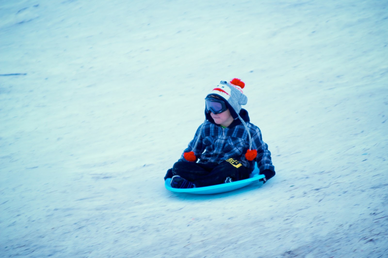 Little Boy Sledding