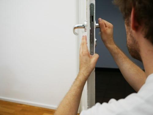 A picture containing person, indoor, man, looking
Description automatically generated