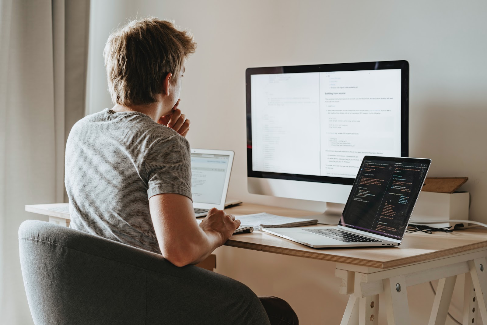 Man working on a development project on his computer