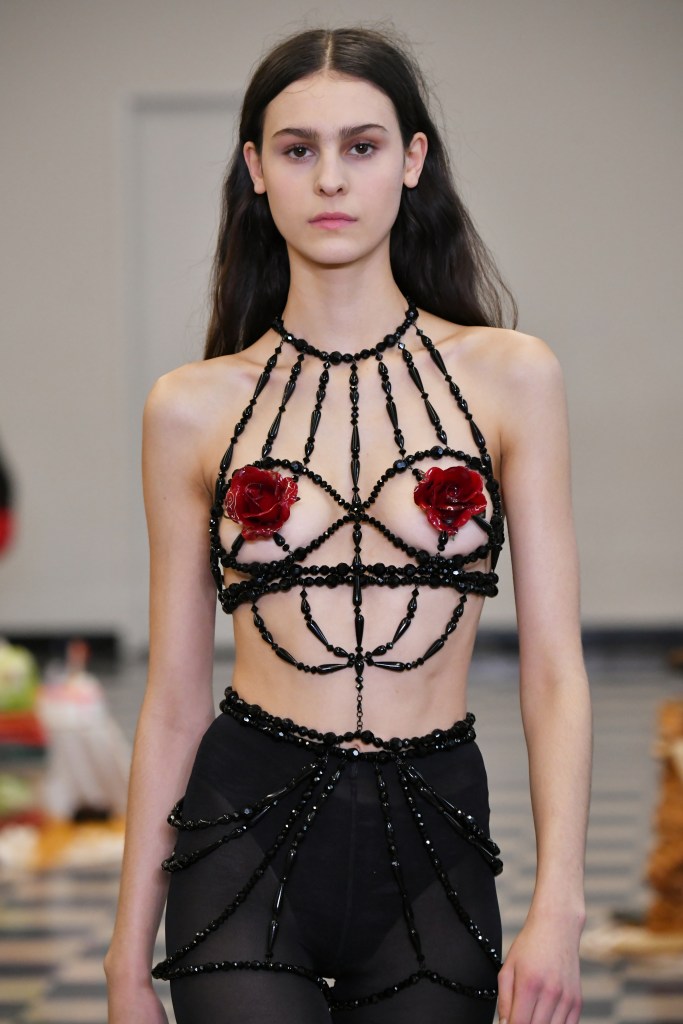 Puppets and Puppets designer Carly Mark served halters made from strings of black beads, strategically topped with resin-sculpted fried eggs or rosebuds.