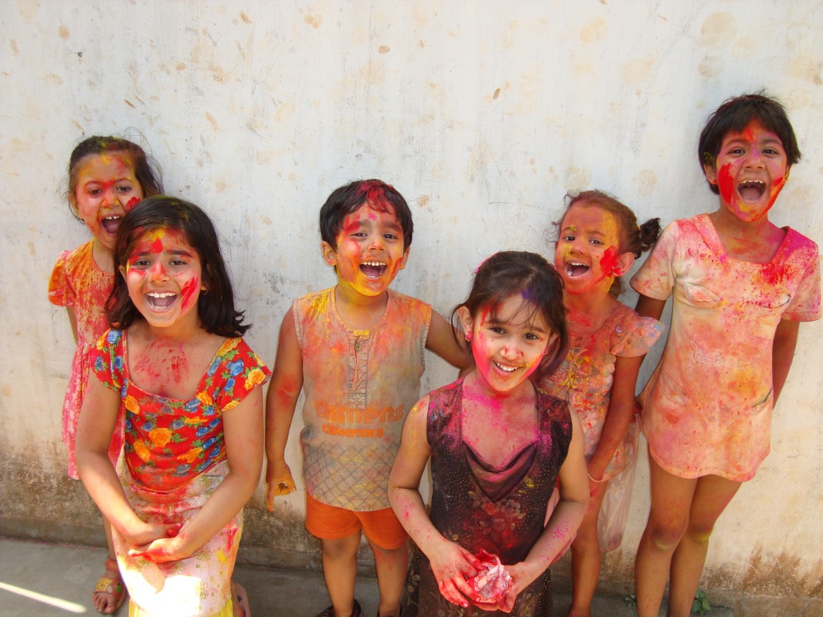 Happy Children Covered In Paint