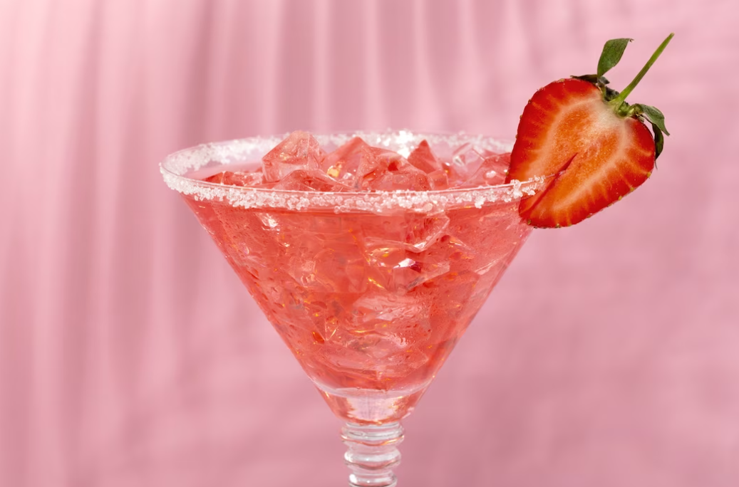 pink cocktail with half a strawberry