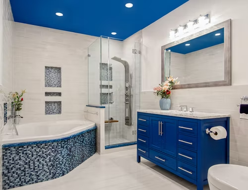 a bathroom with blue ceilings