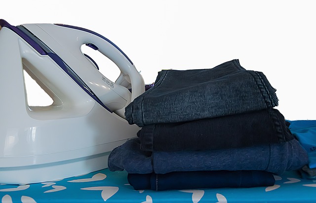 how to pack a large suitcase - arrange clothes in categories