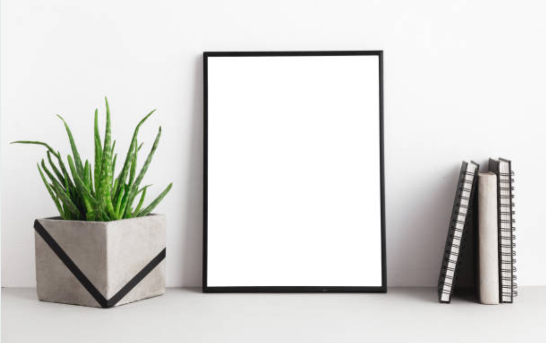 A picture containing text, wall, indoor, picture frame

Description automatically generated