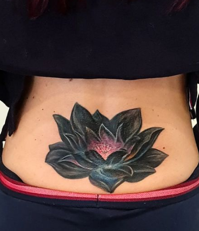 Black Lotus Lower Back Tattoo