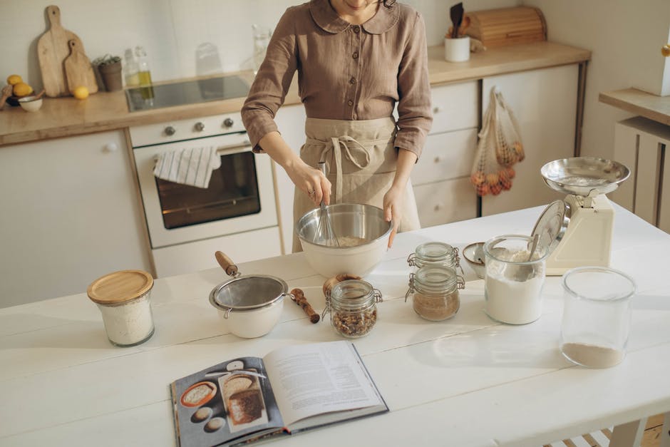 Woman Mixing Baking Ingredients in a Bowl