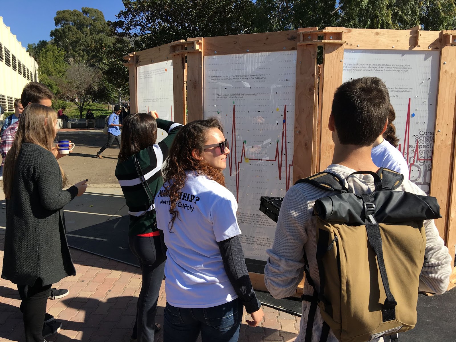 People looking at the piece.