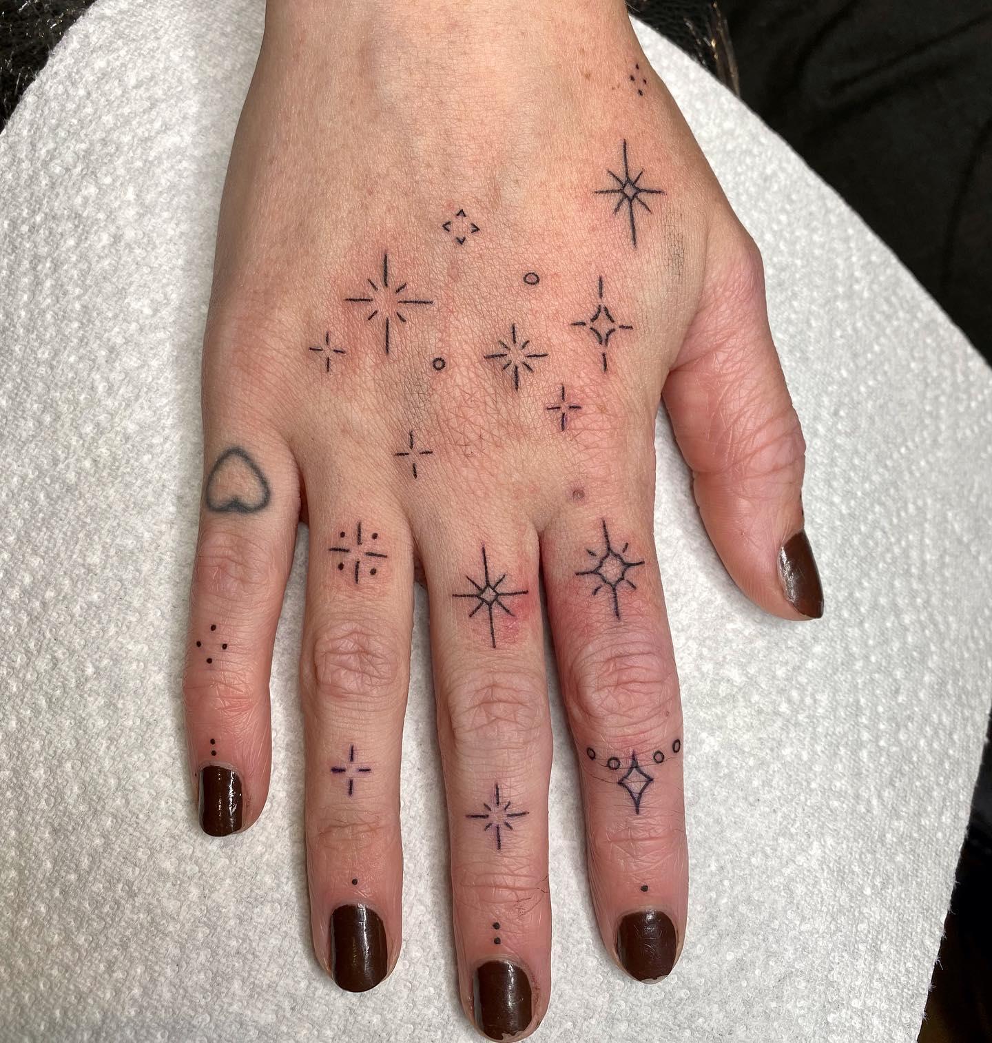 Star Finger Tattoo