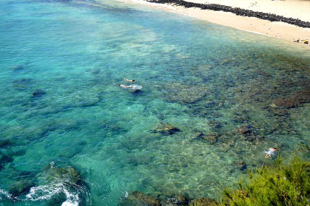 Snorkelers swimming near Shipwreck Beach - Kauai Things to Do: a Guide to the Garden Isle of Hawaii
