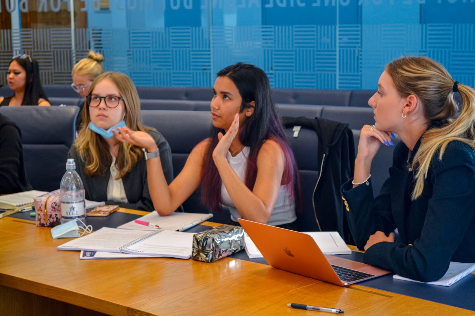 "Three students debating in the Supreme Court on the InvestIN law programme"