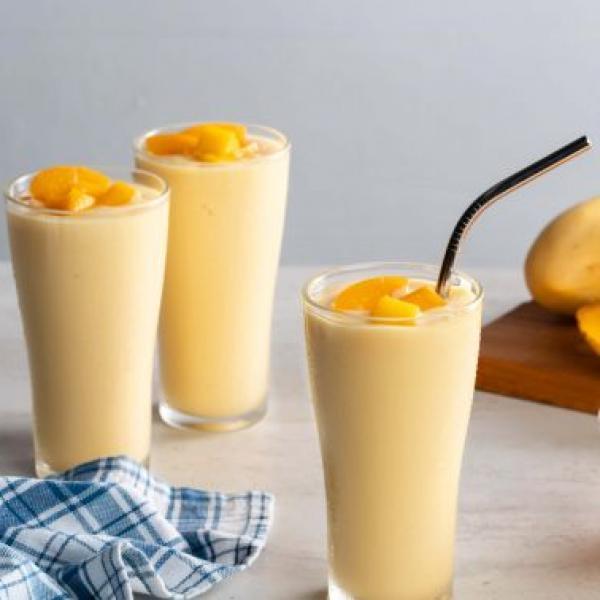 creamy beverage peach and mango smoothies