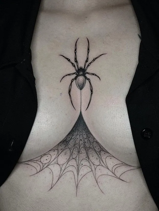 Close up view of the tat on a lady's sternum