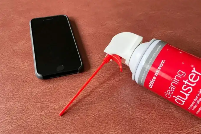 Use Compressed Air to clean iphone speaker