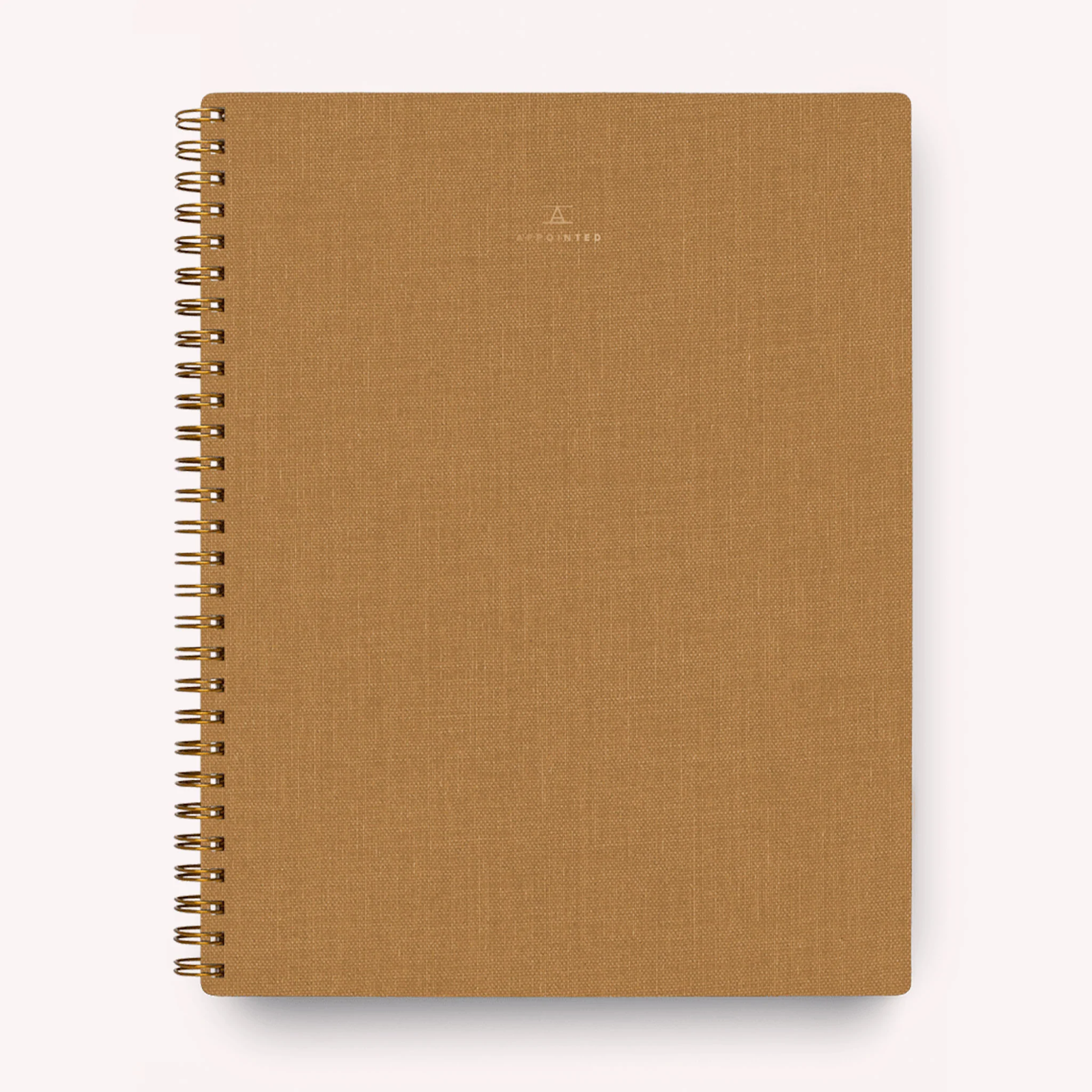 photo of a teak colored notebook
