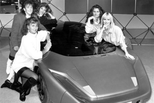 D:\Documenti\posts\posts\Women and motorsport\foto\Essen Motor Show, 1991. Girl racers, a concept car, and some of our currently-favourite early ‘90s fashions. High-waisted loose fitting jeans, and long-line everything..jpg