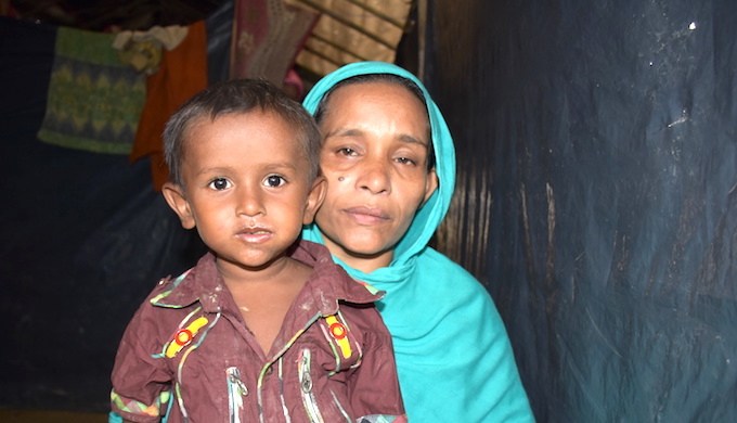 Rokeya Begum has fled to Bangladesh with her children from Bolirbazar in Maungdaw district of Rakhine state in Myanmar. She doesn't know if her husband is still alive (Photo by Zobaidur Rahman)