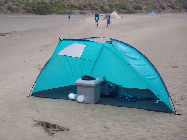 Shelter for river toilet groover on a wide sandy beach on the Green River through Desolation Canyon in Utah 