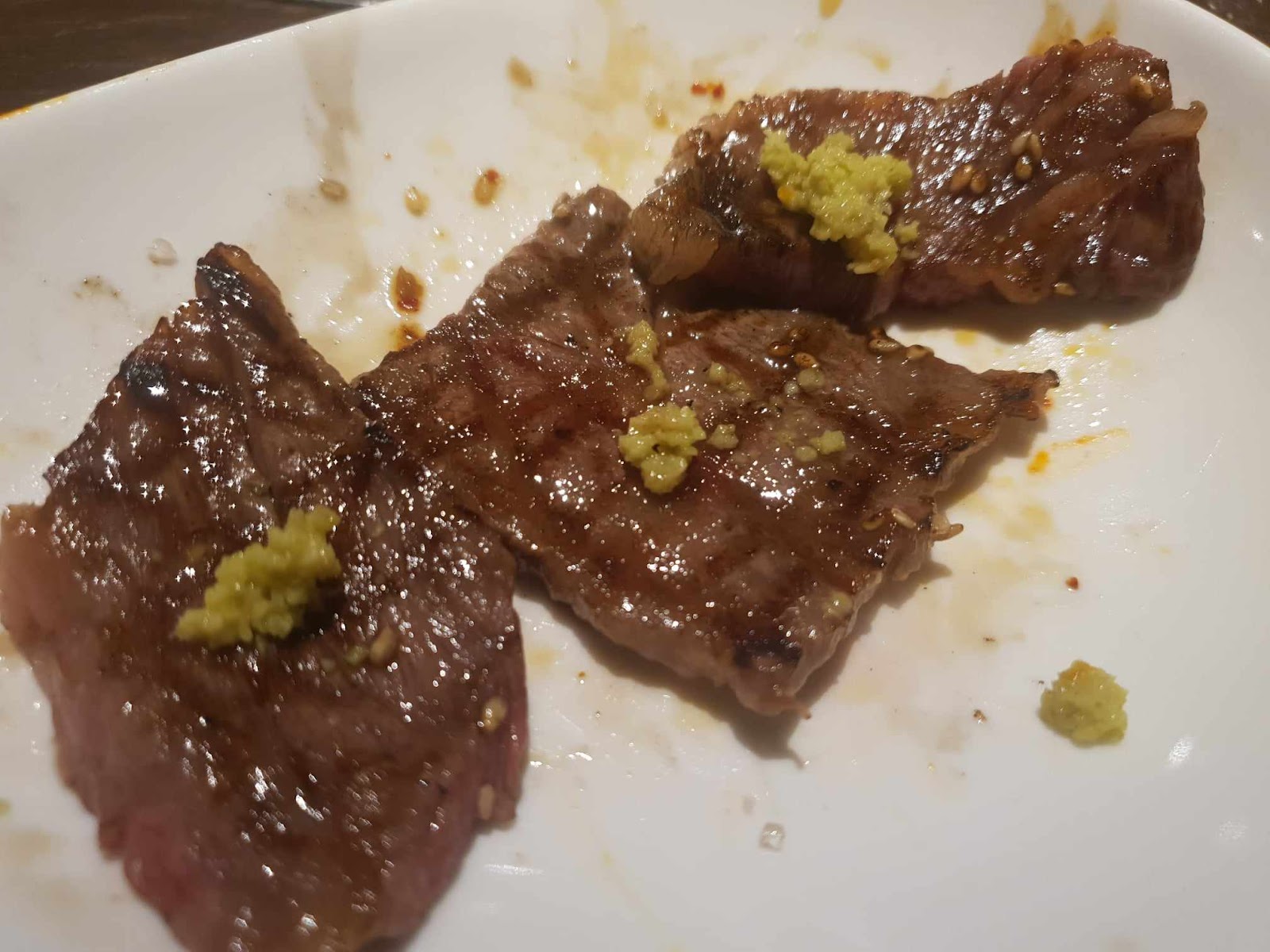 three cuts of Matsusaka wagyu cooked with wasabi on top