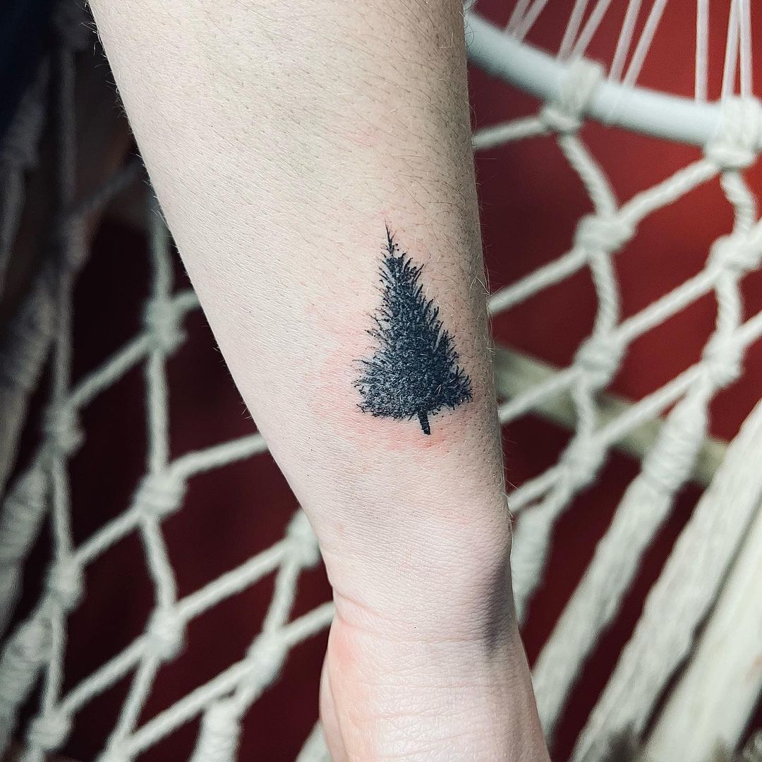 Pine Tree On Wrist Tattoo 