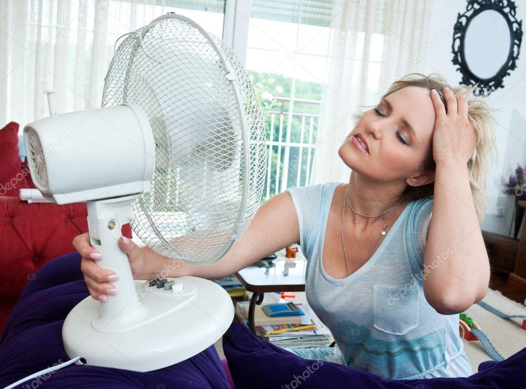 Woman cooling herself — Stock Photo, Image