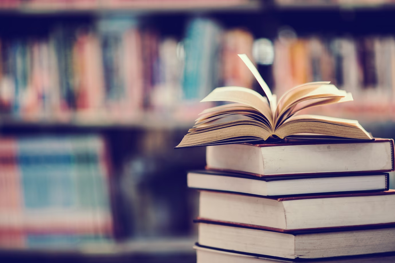 An opened book in a library