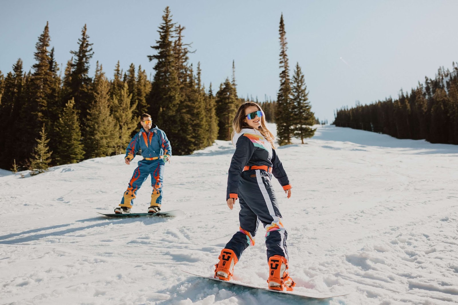 couple snowboarding in Colorado