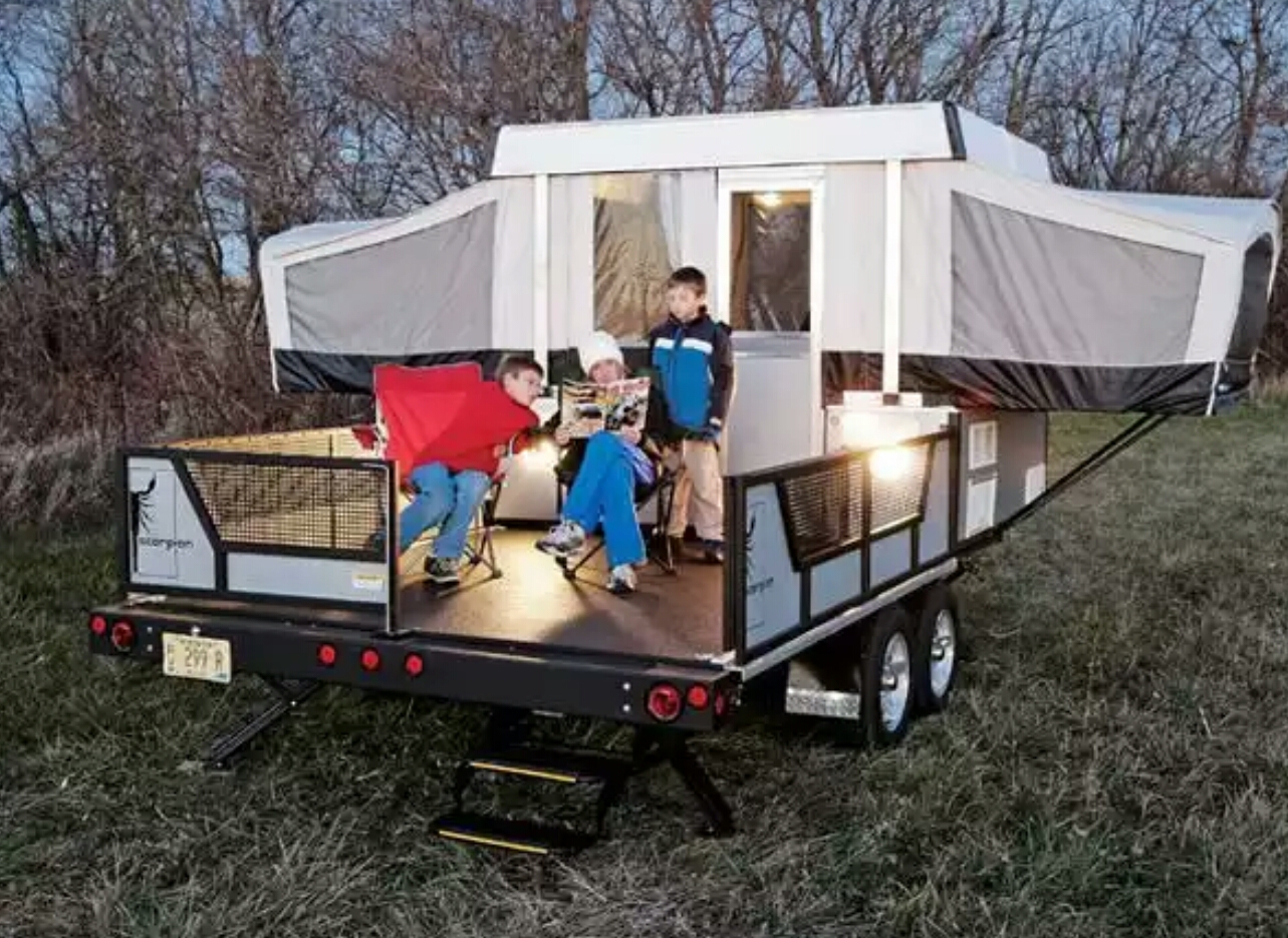 Hauler with double slide-out folding camper