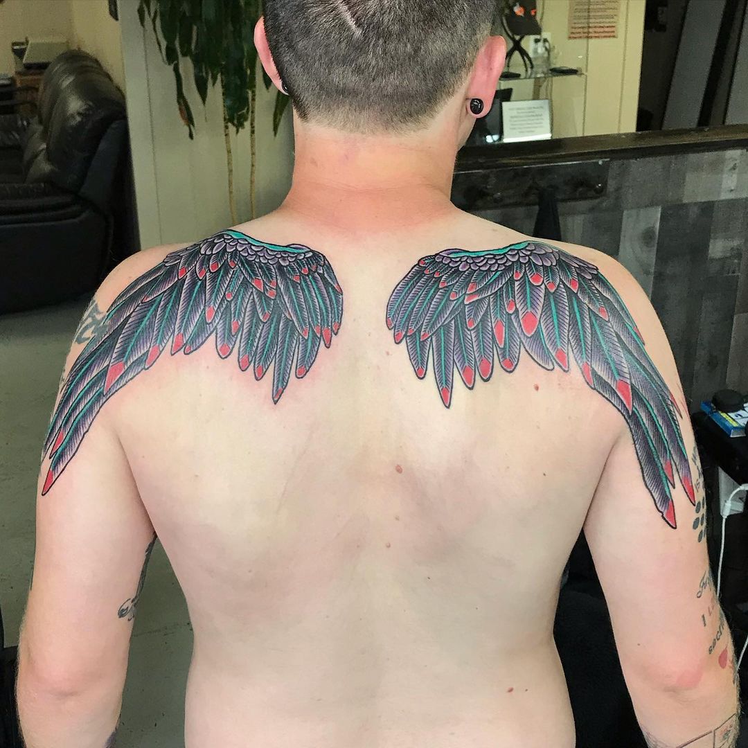 Blue And Red Wings Tattoo