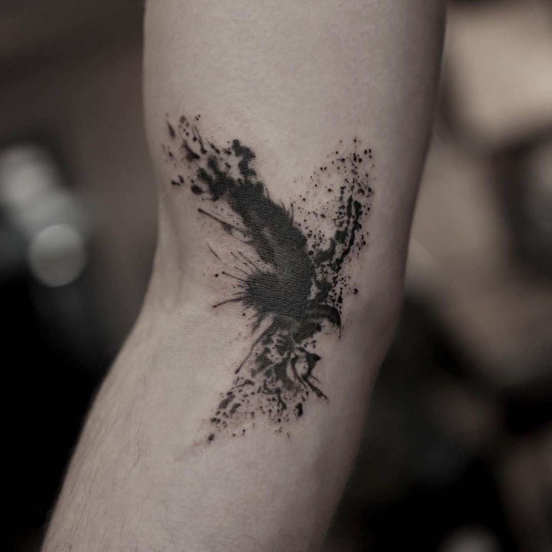 Black Paint Phoenix Tattoo