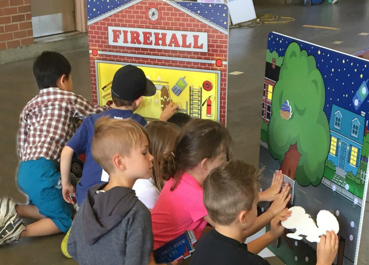 Burnaby BC elementary school kids dressing the scenes of the fully involved home safe system by Prevention Connection.jpg