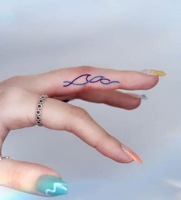 Full picture of the wave finger tattoo