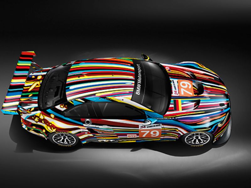Sports car with rainbow streaks. 