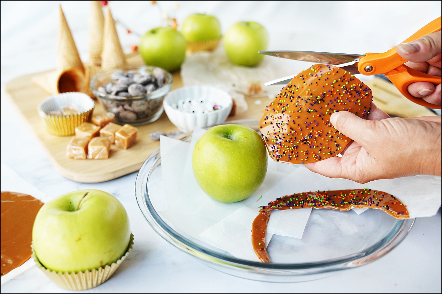 Use scissors to cut circles to fit on top of each apple.
