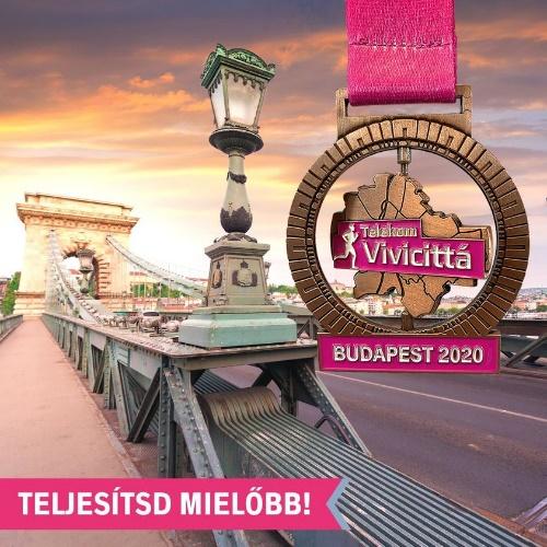 Lehet, hogy egy kép erről: állás, emlékmű, szabadtéri és , szöveg, amely így szól: „Telekom Vivicittá BUDAPEST 2020 TELJESÍTSD MIELŐBB!”